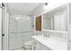 Bathroom with white shower, vanity, and neutral colors at 2794 Farmstead Se Rd, Smyrna, GA 30080