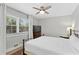 Cozy bedroom with ceiling fan, natural light, and neutral colors at 2794 Farmstead Se Rd, Smyrna, GA 30080