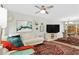 Cozy living room featuring stylish decor, ceiling fan, and adjacent dining area at 2794 Farmstead Se Rd, Smyrna, GA 30080