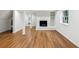 Basement featuring new luxury vinyl plank flooring, a brick fireplace, and white trim at 3356 Thornewood Dr, Atlanta, GA 30340