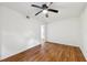 Bright bedroom features wood floors, a ceiling fan, and neutral paint at 3356 Thornewood Dr, Atlanta, GA 30340