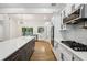 Modern kitchen featuring stainless steel appliances, island, and open layout at 3356 Thornewood Dr, Atlanta, GA 30340