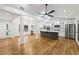 Bright, open kitchen with modern appliances, a large island, and hardwood floors throughout the living space at 3356 Thornewood Dr, Atlanta, GA 30340