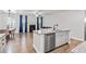 Lovely kitchen featuring stainless steel appliances, granite countertops, and wood floors at 6179 Centennial Run, Atlanta, GA 30349