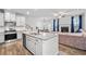 Open kitchen and living space, great for entertaining at 6179 Centennial Run, Atlanta, GA 30349