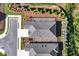 An aerial view of two homes showcasing their roof lines, landscaping, and proximity to each other and the surrounding community at 7 Hickory Branch, Hiram, GA 30141