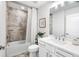 Clean bathroom with neutral tile, modern fixtures, and a shower-tub combination at 7 Hickory Branch, Hiram, GA 30141