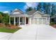 Charming single-story home with inviting porch and a two-car garage at 7 Hickory Branch, Hiram, GA 30141