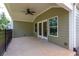 Covered patio with ceiling fan and view of backyard at 7 Hickory Branch, Hiram, GA 30141