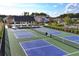 Pickleball courts showcasing multiple courts and a covered seating area, all within a beautifully landscaped community at 7 Hickory Branch, Hiram, GA 30141