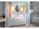 Clean bathroom with a marble counter and a glass shower stall at 1691 Doncaster Ne Dr, Atlanta, GA 30309