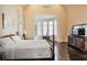 Spacious primary bedroom features a bay window and hardwood floors at 1691 Doncaster Ne Dr, Atlanta, GA 30309
