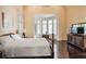 Spacious bedroom featuring a bay window with plantation shutters at 1691 Doncaster Ne Dr, Atlanta, GA 30309