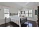 Cozy bedroom featuring hardwood floors and lots of windows at 1691 Doncaster Ne Dr, Atlanta, GA 30309