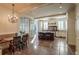 Open kitchen with island, granite countertops, stainless steel appliances, and access to outdoor area at 1691 Doncaster Ne Dr, Atlanta, GA 30309