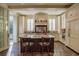 Gourmet kitchen with granite countertops, island with seating, and modern appliances at 1691 Doncaster Ne Dr, Atlanta, GA 30309