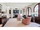 Inviting living room features a fireplace, built-in shelving, and plenty of natural light at 1691 Doncaster Ne Dr, Atlanta, GA 30309
