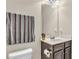 This bathroom features a vanity with dark wood cabinets and a towel rack at 80 Lanier Rdg, Acworth, GA 30101