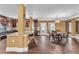 Open dining room with hardwood floors, dark wood trim and furniture with views to the kitchen at 80 Lanier Rdg, Acworth, GA 30101