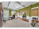 Formal living room featuring coffered ceilings, picture windows, and access to the Primary bedroom at 80 Lanier Rdg, Acworth, GA 30101