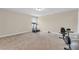 Spacious carpeted workout room with equipment and natural light at 80 Lanier Rdg, Acworth, GA 30101