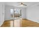 Living room with access to a balcony overlooking the neighborhood at 869 Briarcliff Ne Rd # B11, Atlanta, GA 30306
