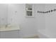 Bathroom with a modern vanity, updated fixtures, and a tiled bathtub and shower at 869 Briarcliff Ne Rd # B11, Atlanta, GA 30306
