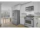 Modern kitchen with stainless steel appliances and ample counter space at 869 Briarcliff Ne Rd # B11, Atlanta, GA 30306
