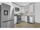 Well-equipped kitchen with stainless steel appliances and white cabinets at 869 Briarcliff Ne Rd # B11, Atlanta, GA 30306