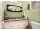 Chic bathroom showcasing a stylish mirror, sleek vanity, and modern fixtures at 105 Governors Dr, Forest Park, GA 30297