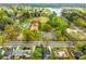Bird's eye view of houses near a park offering scenic views of a lake and greenery, enhancing the community's allure at 51 Willow Wood Se Cir, Atlanta, GA 30317