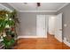 Bedroom with hardwood floors, lots of plants and natural light, and neutral-toned walls at 51 Willow Wood Se Cir, Atlanta, GA 30317