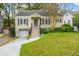Attractive one-story home with beautiful landscaping, updated garage, and inviting front entrance at 51 Willow Wood Se Cir, Atlanta, GA 30317