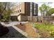 Backyard scene with shed, patio, landscaped garden, and fenced perimeter at 891 Spencer Nw St, Atlanta, GA 30314