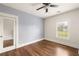Cozy bedroom with hardwood floors, ample natural light, and a calm, relaxing atmosphere at 891 Spencer Nw St, Atlanta, GA 30314