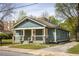 View of the home showing its exterior finishes, landscaping, and overall street presence at 891 Spencer Nw St, Atlanta, GA 30314