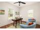 Cozy office space with hardwood floors, dual windows, and seating for meetings at 891 Spencer Nw St, Atlanta, GA 30314