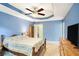 The main bedroom provides an open floor plan and nice lighting at 1019 James Madison Ct, Mcdonough, GA 30253