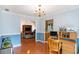 Office space featuring wood floors adjacent to the kitchen at 1019 James Madison Ct, Mcdonough, GA 30253