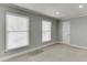 Bright bedroom with neutral walls, two windows, and plush carpeting, creating a serene and inviting atmosphere at 102 Defoors Mill Dr, Atlanta, GA 30318