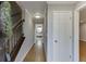 Inviting foyer featuring hardwood floors, staircase, and neutral paint at 102 Defoors Mill Dr, Atlanta, GA 30318