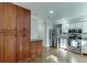 Kitchen boasts stainless steel appliances, granite countertops, and custom wood cabinetry, perfect for culinary enthusiasts at 102 Defoors Mill Dr, Atlanta, GA 30318