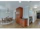 Open-concept dining area transitions seamlessly to a conveniently located laundry area, offering modern living solutions at 102 Defoors Mill Dr, Atlanta, GA 30318