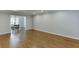 Spacious living room with hardwood floors and neutral paint palette at 102 Defoors Mill Dr, Atlanta, GA 30318