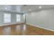 Bright living room with hardwood floors and modern recessed lighting at 102 Defoors Mill Dr, Atlanta, GA 30318