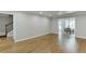 Open-concept living area boasting hardwood floors and lots of natural light at 102 Defoors Mill Dr, Atlanta, GA 30318