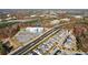 Aerial view showcasing community near businesses and highways at 2172 Haventree Ct, Lawrenceville, GA 30043