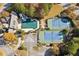 Aerial view of community pool and tennis courts at 2172 Haventree Ct, Lawrenceville, GA 30043