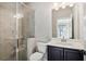 Bathroom featuring a large, glass-enclosed shower and vanity at 2172 Haventree Ct, Lawrenceville, GA 30043