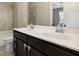 Bathroom featuring dual sinks with vanity, white countertops, and a shower-tub combination at 2172 Haventree Ct, Lawrenceville, GA 30043